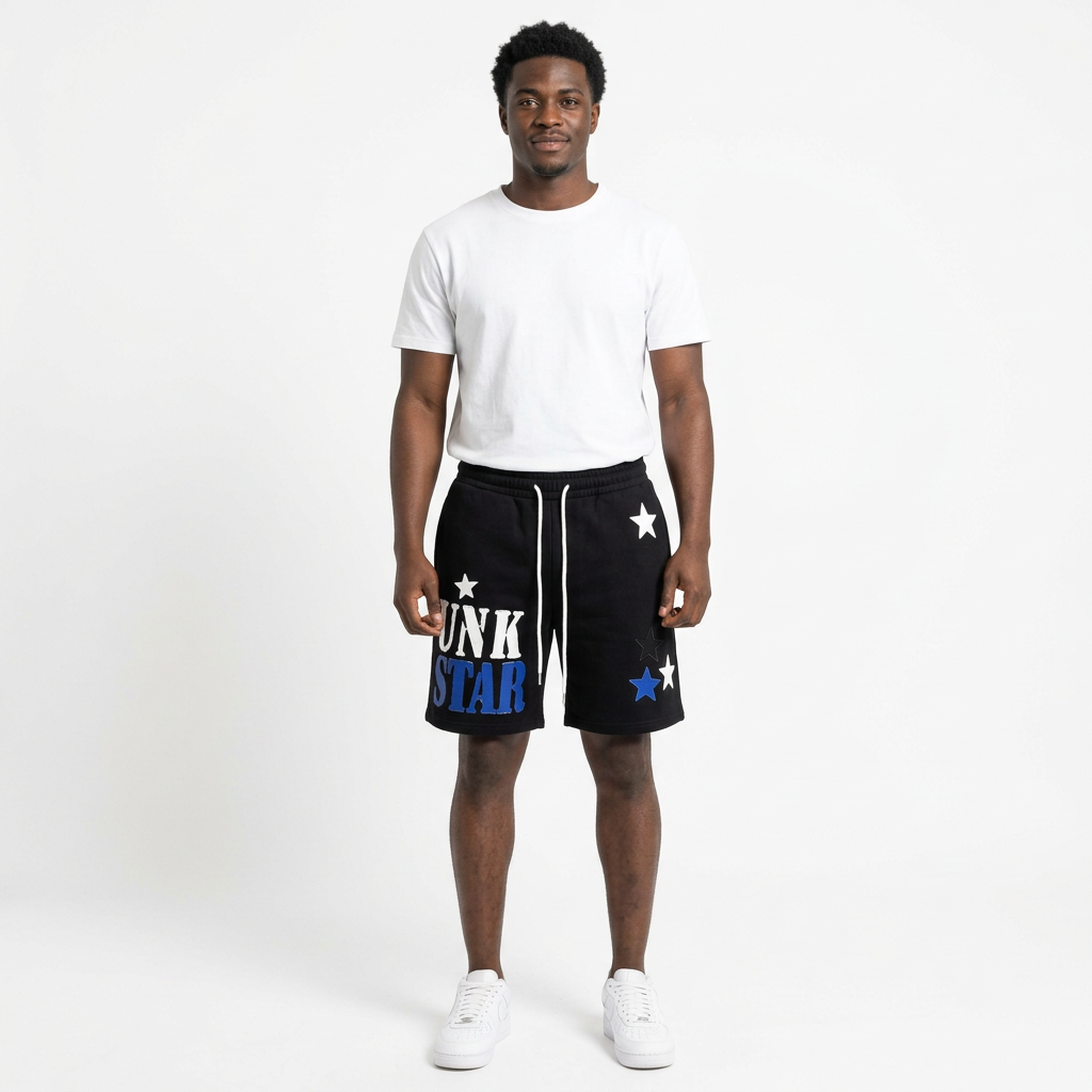 Full-body adult Black man wearing black blue and white star-graphic shorts