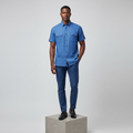 Nigerian male model wearing royal blue linen-texture short-sleeved shirt