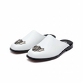 White leather lion badge half shoe mule ghost mannequin product shot, plain white background