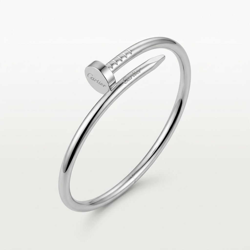 Silver-tone nail-shaped bracelet isolated on white