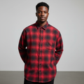 Male model wearing red ombre plaid long sleeve shirt