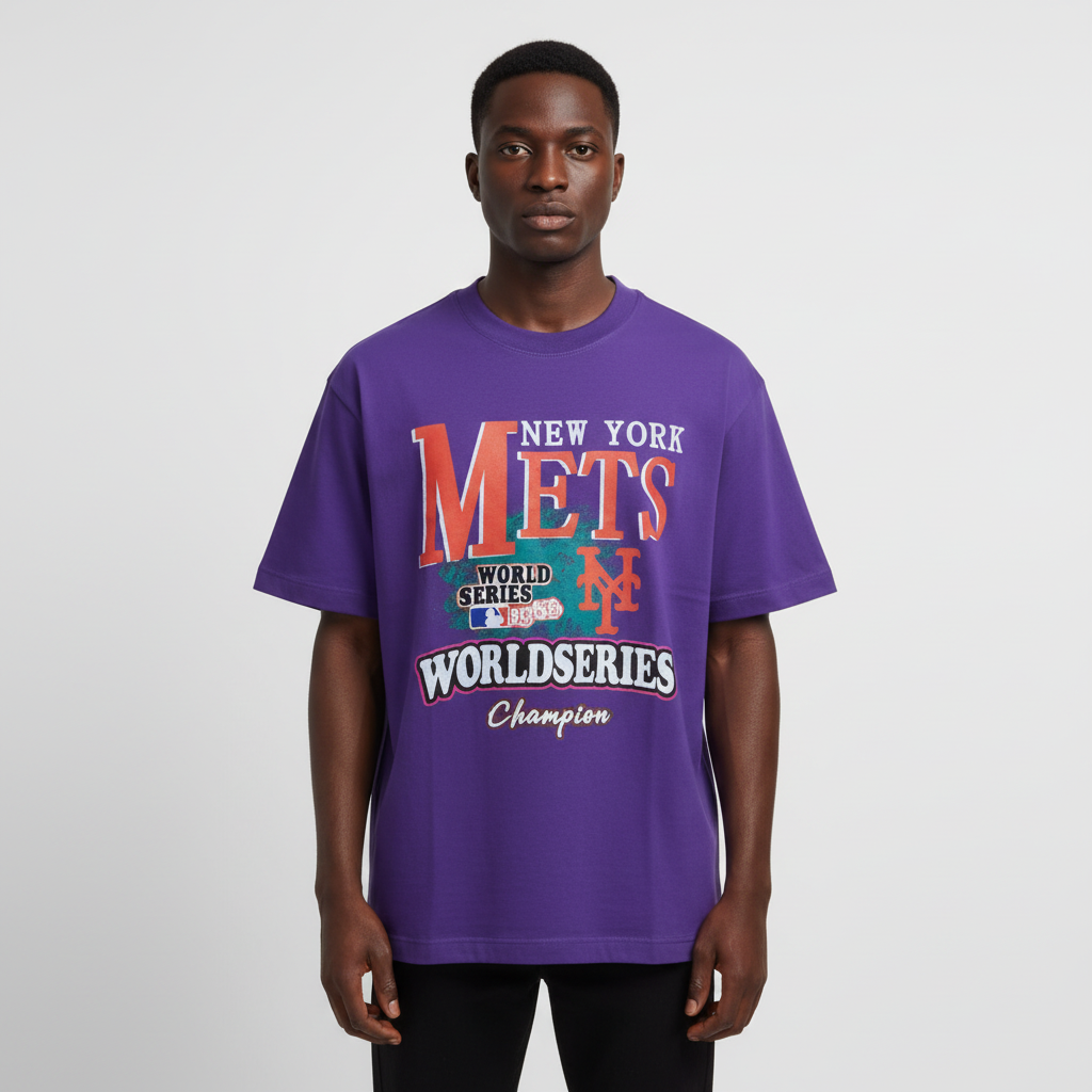 Black Nigerian male model wearing a purple graphic T-shirt in a square catalog image
