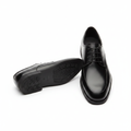 Clarks all-black polished leather apron toe Derby lace-up shoe ghost mannequin product shot, plain white background