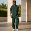 Male model wearing forest green polo and trouser two-piece set