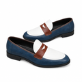 Pair of navy and ivory two-tone loafers with chestnut penny straps on white