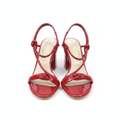 Women's red patent leather knotted strap block heel sandals ghost mannequin pair view