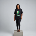 Nigerian female model front view wearing black cartoon character streetwear T-shirt