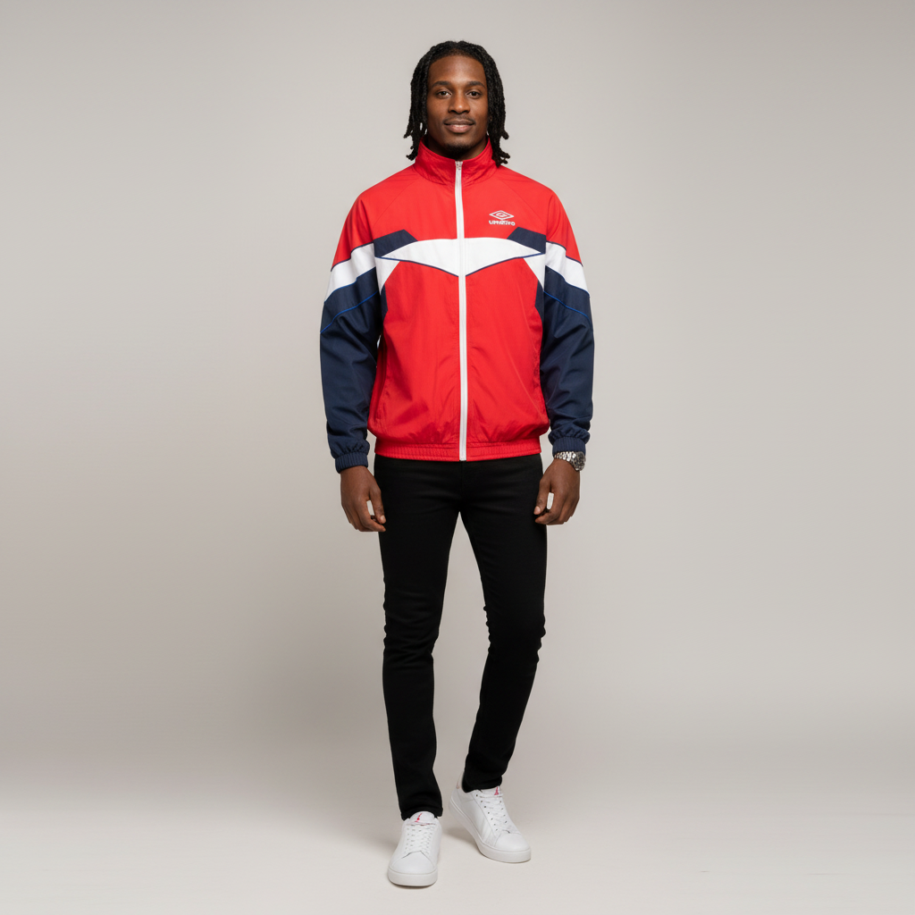 Model wearing the red and navy colourblock track jacket