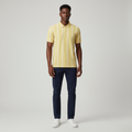 Nigerian model wearing yellow vertical stripe polo shirt