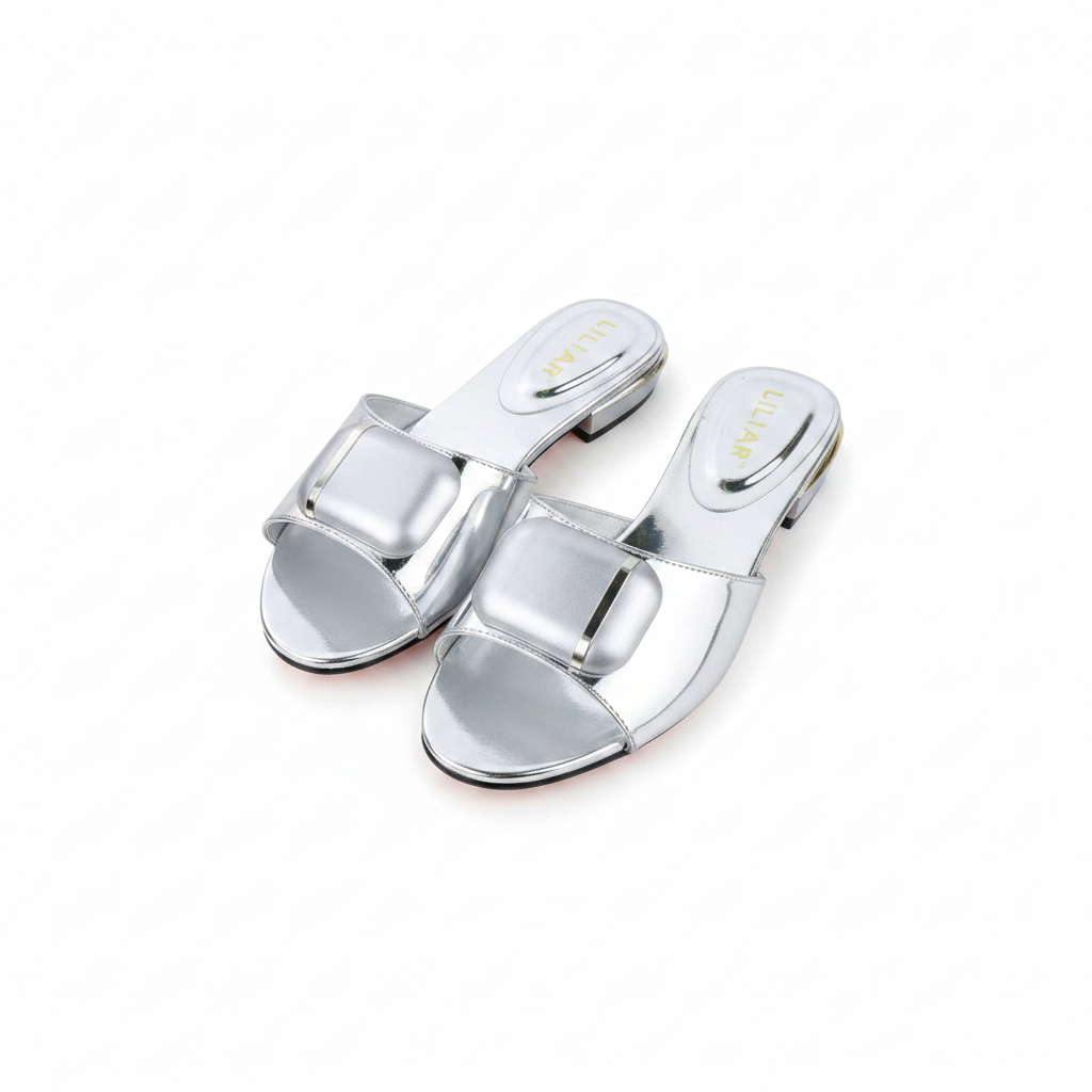 Ghost mannequin pair view of silver metallic square buckle flat slide slippers