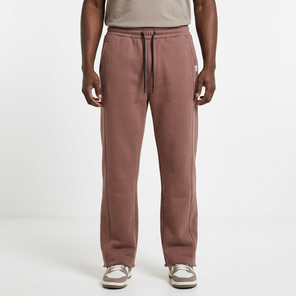 Adult Black model wearing rose-brown seam-detail drawstring joggers