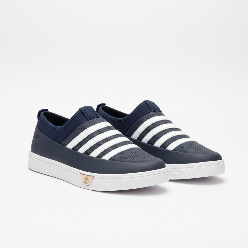 Men's navy blue three-stripe slip-on sneakers with gold heel badge pair product shot