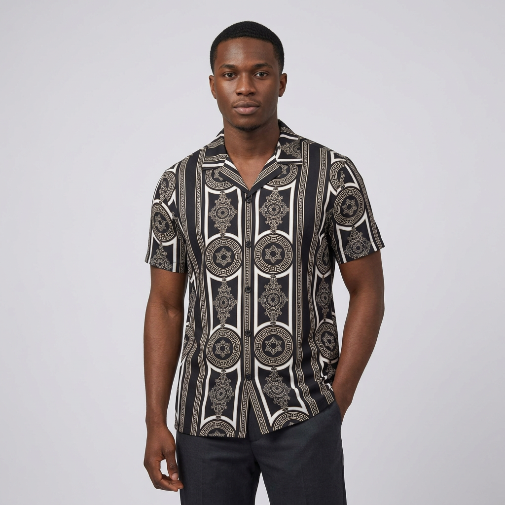 Nigerian man wearing black white and muted gold baroque medallion shirt