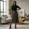 Young Nigerian female model wearing black plaid mesh pleated midi skirt