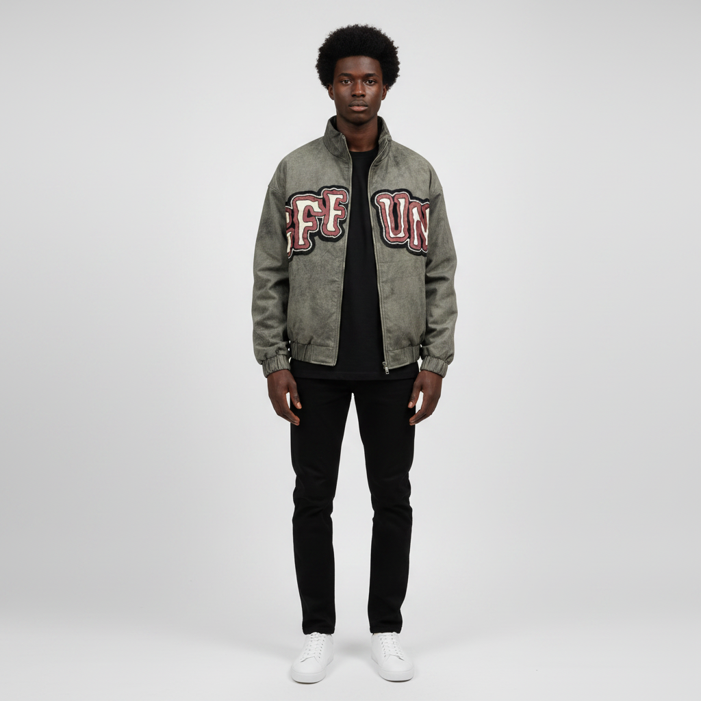 Man wearing the washed grey varsity patch bomber jacket