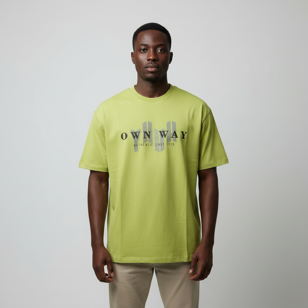 Model wearing the lime green Own Way layered text t-shirt