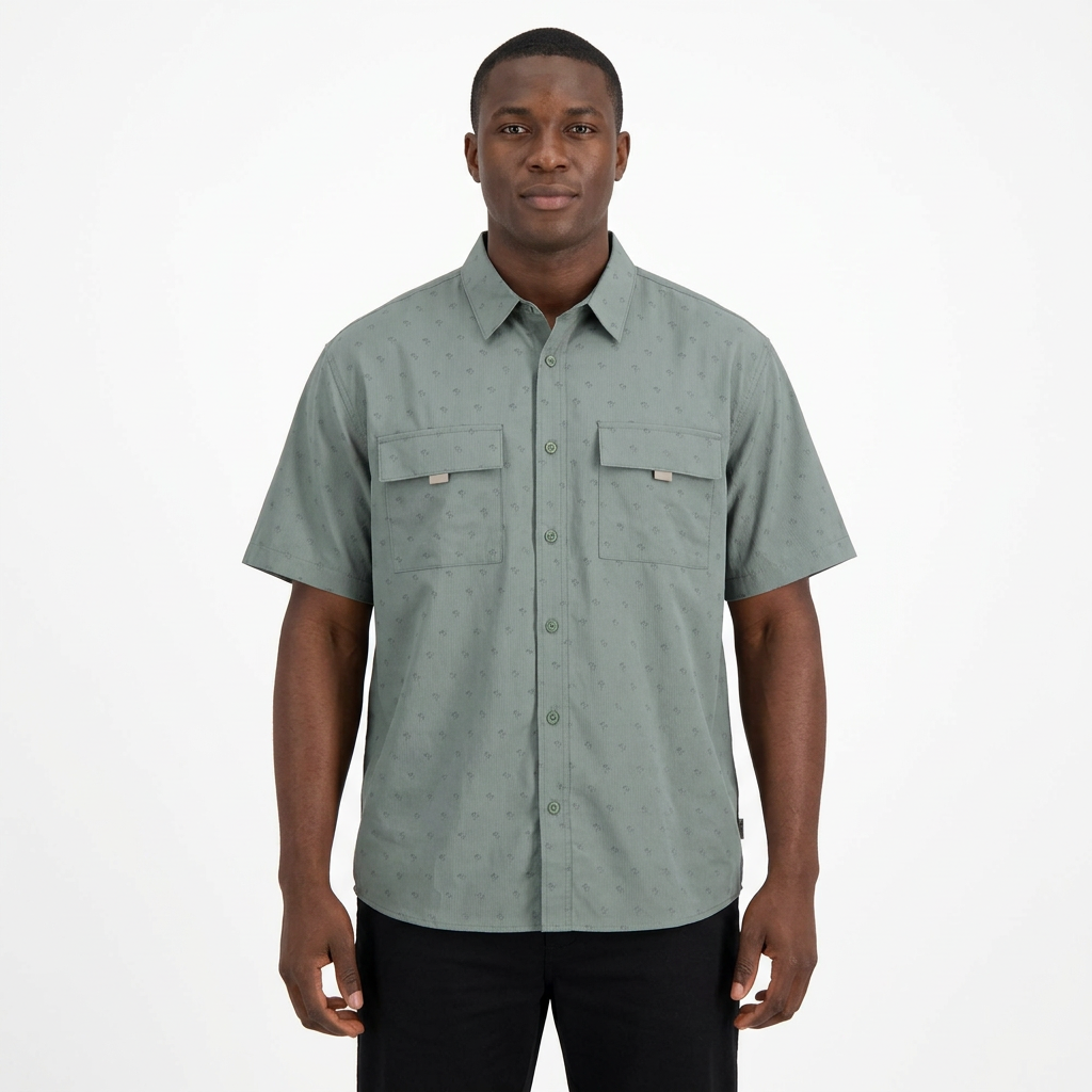 Grey-green patterned two-pocket shirt worn with black trousers