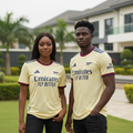 Nigerian female and male models wearing pale yellow jacquard texture football jersey