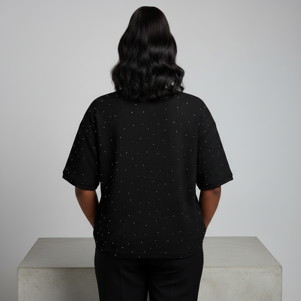 Nigerian female model back view - black rhinestone Minnie Mouse graphic top