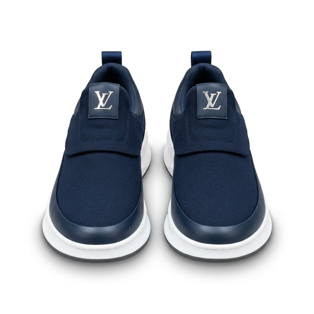Matching pair of navy slip-on trainers with white soles on white