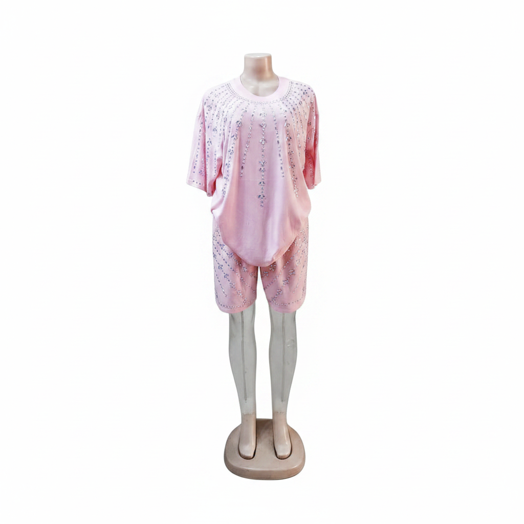 Ghost mannequin front view - pink cascading rhinestone top and shorts set