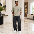 Man wearing taupe washed oversized pocket tee