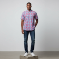 Nigerian male model wearing red blue plaid short-sleeved shirt