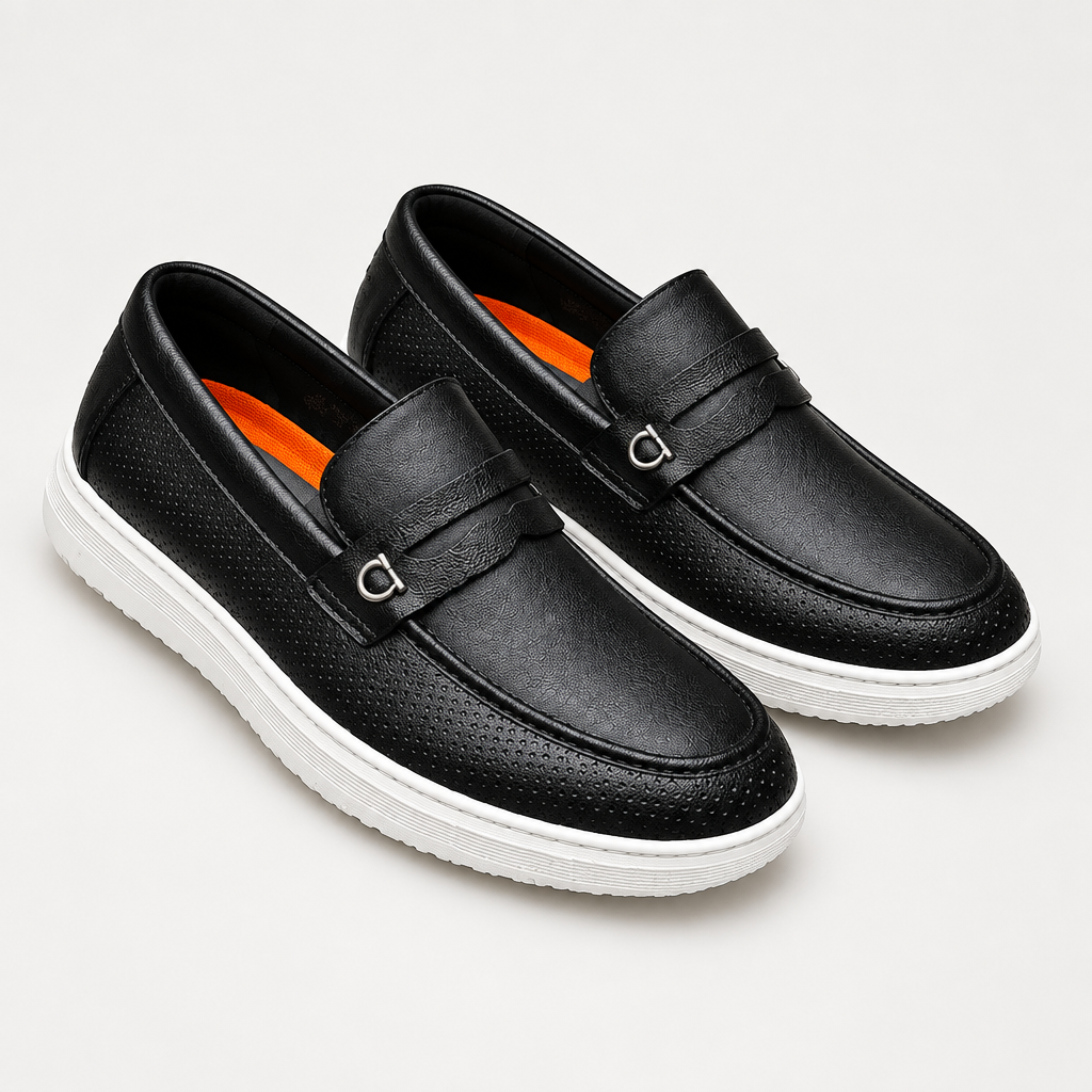 Black perforated ring loafer pair on a clean background