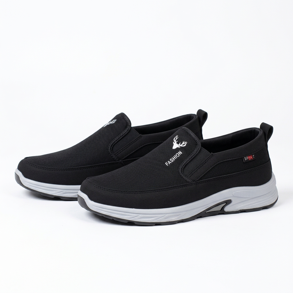 Black contrast-sole slip-on shoes, pair on a white background