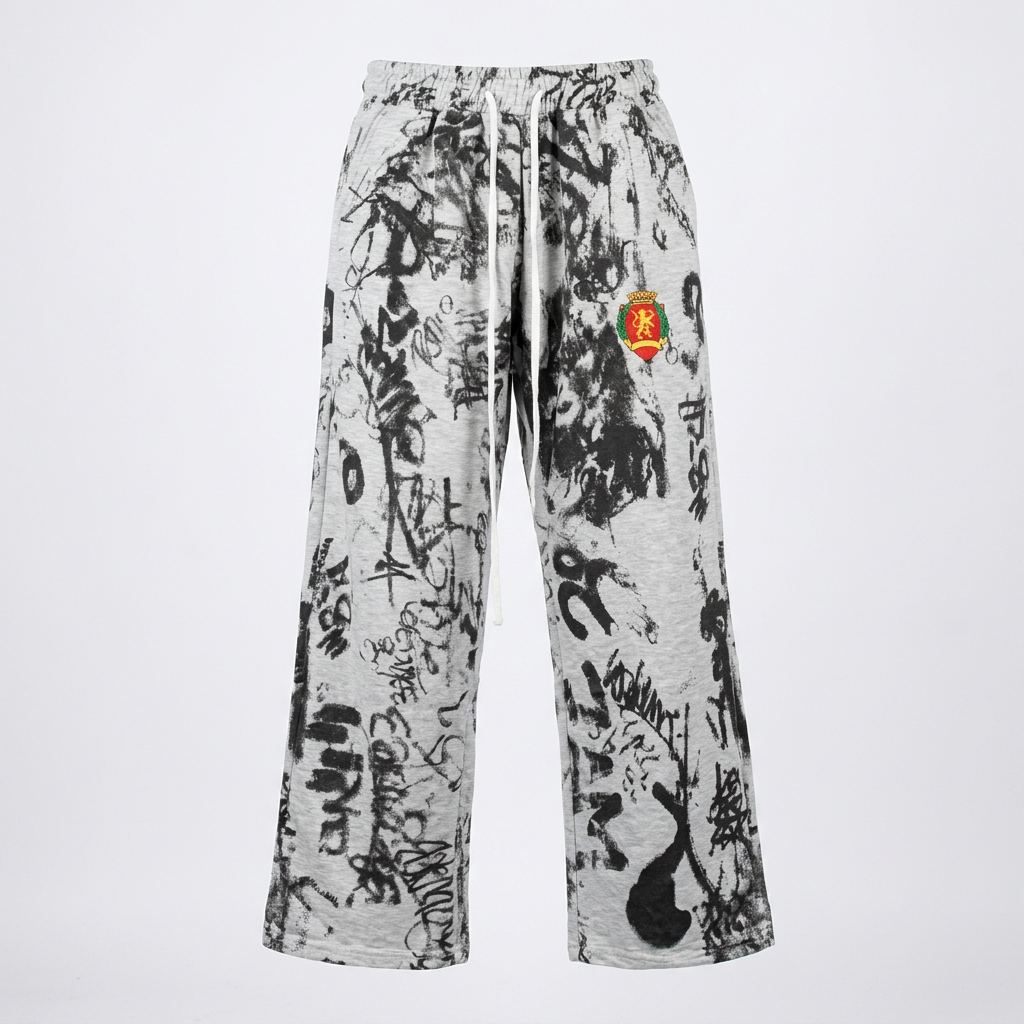 Light grey graffiti-print drawstring joggers with coloured thigh patch, generated ghost mannequin view