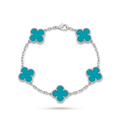 Silver-tone five-clover turquoise-colour bracelet on white