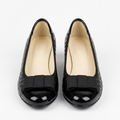Matching black croc-embossed bow wedge shoes