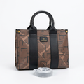 Brown patterned tote bag with black double handles and matching wrapped strap on a white background