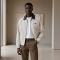 Model wearing cream contrast collar zip-up jacket