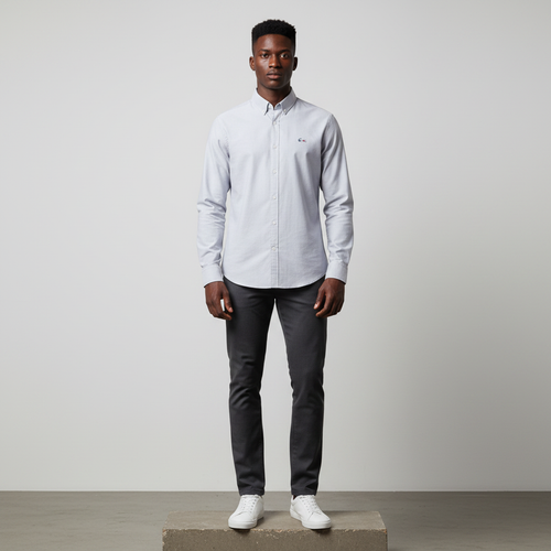 Nigerian male model wearing silver grey plain long-sleeved shirt, front view