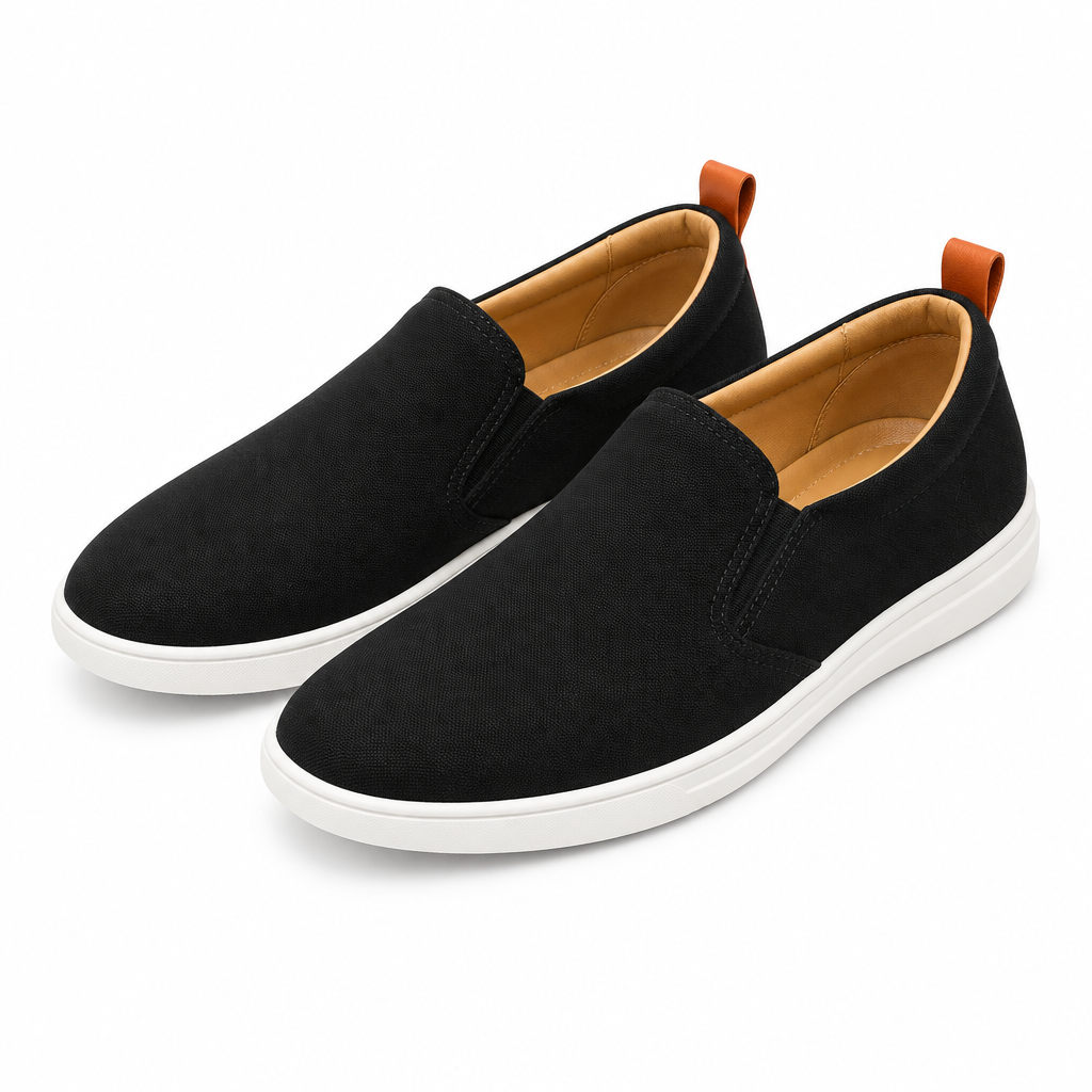 Black textile slip-on shoes with tan lining pair