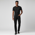 Nigerian male model wearing black studded denim jeans