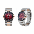 Co-Axial chronometer watch with red sunburst dial, front and side view on white background