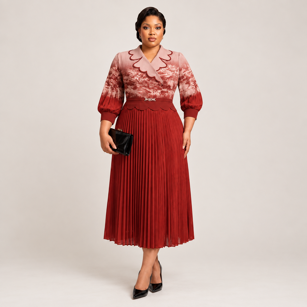 Black Nigerian model wearing a wine-red pleated gown with a patterned bodice and scalloped collar