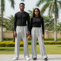 Nigerian male and female models wearing unisex grey wide-leg jogger trousers with double white front stripe panels, clean outdoor setting, 1:1 square