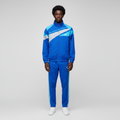 Man wearing the royal blue chevron tracksuit set