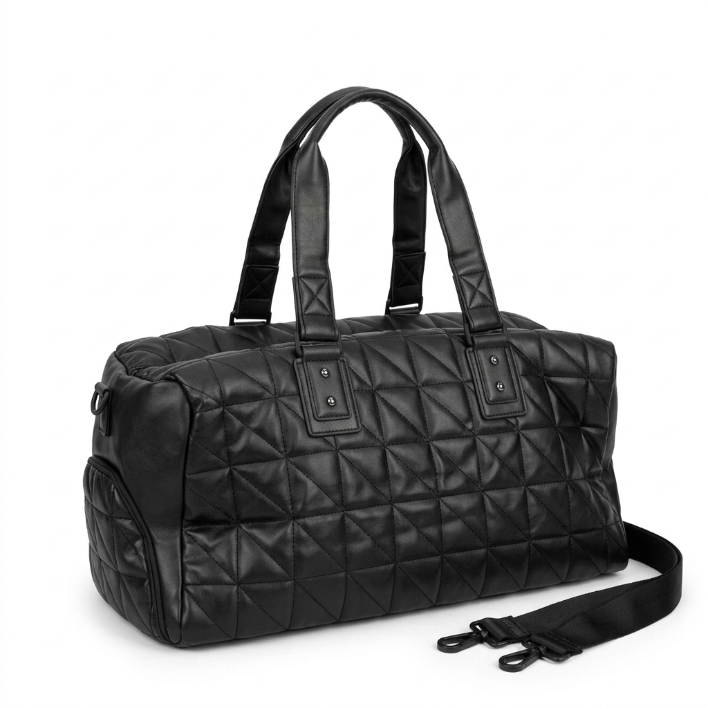 Black geometric-quilted duffle bag with padded handles