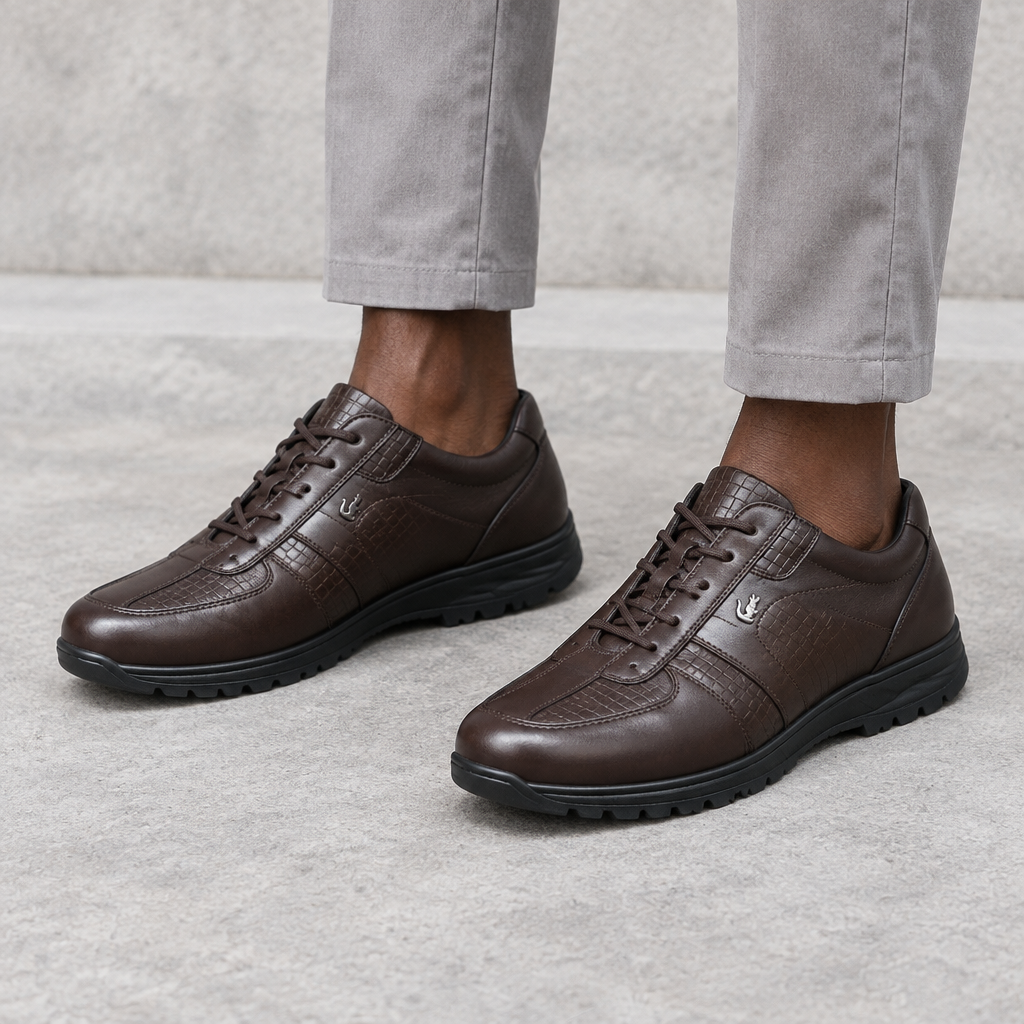Brown textured lace-up shoes worn on both feet