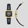 Gold-tone watch with charcoal sunray dial and navy textured strap shown from the front and side