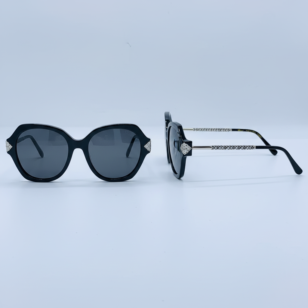 Unisex oversized round black sunglasses with silver hinge detail – front and side view on white background