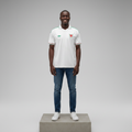 Nigerian male model wearing white retro polo football jersey on concrete plinth