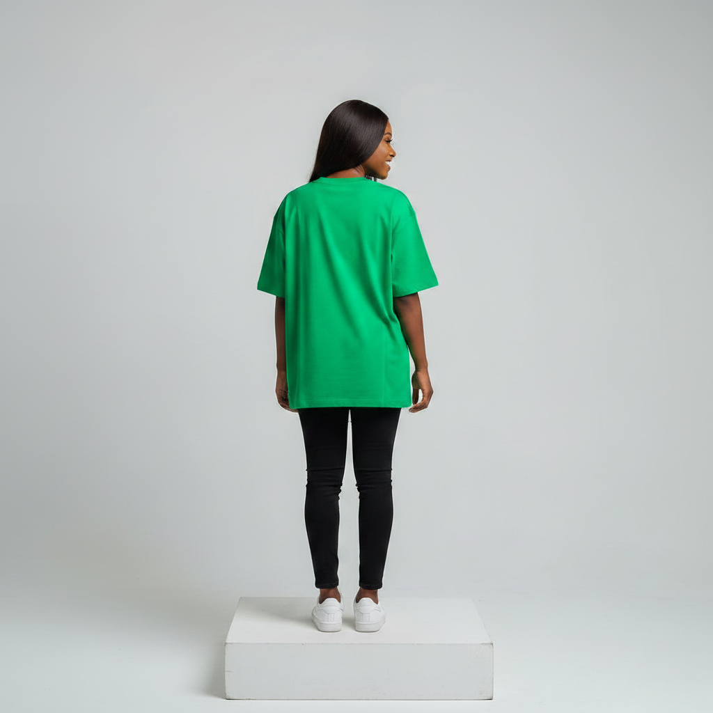 Nigerian female model back view wearing plain bright green T-shirt - consistent model