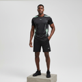 Nigerian male model wearing black and mint green sports jersey set
