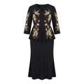 Black floral peplum top and midi skirt set on an invisible mannequin