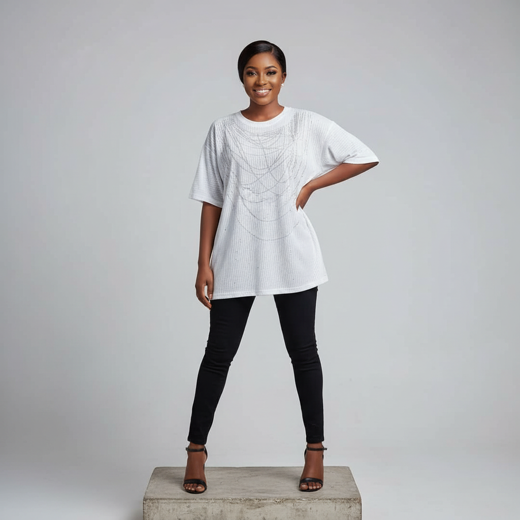 Nigerian female model front view - white ribbed rhinestone arc graphic top